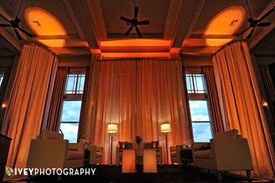 White poly drape columns & backdrop for stage interview