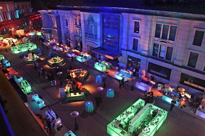 Keeping with the light and color theme, light box tables ensured attendees invitation to the green bars, blue food buffets and purple gifting stations