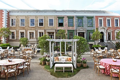 In 2012, Brownstone Street was transformed into a charming Southern Country setting with a centerpiece of three garden porch swings surrounded by spring flowers