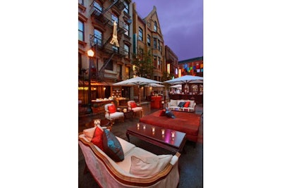 Acorn street lamps, light box signage and animated neon led guests to food and activity areas. 11ft market umbrellas created a European ambience
