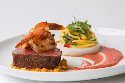 Ancho Rubbed Filet of Beef and Grilled Shrimp with Achiote Rice, Pickled Jicama, Mango & Salsa de Arbol