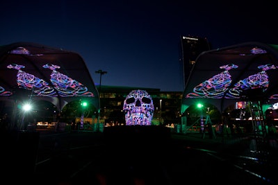 A projection-mapped 24-foot art piece was the visual centerpiece of the Adobe Max Bash.