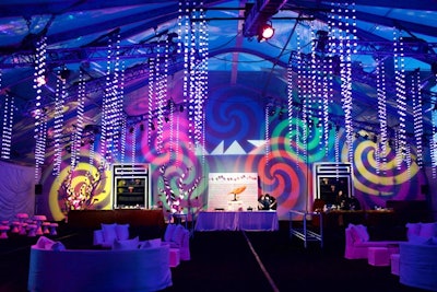 Beaded strands of color-changing LED bulbs hung from the ceiling in the dessert tent.