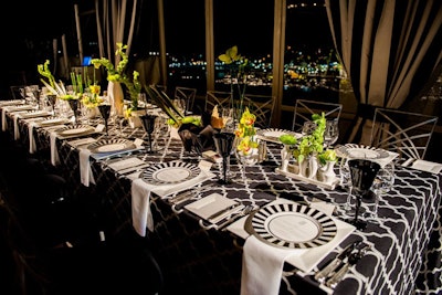 “We have used linens by Party Tables in three recent events, including a party in Chattanooga [Tennessee], where I used a custom-made black-and-white pattern to fit the estate tables ranging in length from 16 to 60 feet. For a destination on Amelia Island [in Florida], Party Tables made custom jackets to fit over the venue’s existing wood barstools along with cloths for the highboys and pillows to accent the soft seating areas. It was one linen, three ways!” —Steve Bales of Bold American Events in Atlanta Linens, price upon request, available nationwide from Party Tables