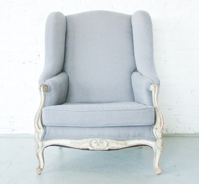 The reupholstered armchair in gray linen from Patina adds an Old World luxe feel to events. The Dorian Grey chair, $165 per day, is available nationwide and in Canada.