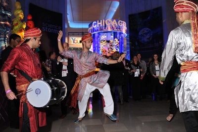 The south main level was inspired by Devon Avenue. Referencing the neighborhood's Indian community, Bollywood dancers performed. There was also a henna hand-painting station, free bangle bracelets, and appetizers such as eggplant sliders.