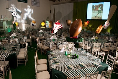 For the 2010 St. Patrick’s Episcopal Day School's sports-theme benefit in Washington, held in the school's gymnasium, centerpieces were oversize versions of athletic objects by commercial sculptor A.J. Strasser.
