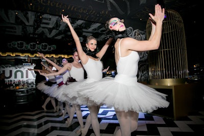 At the Foxtail bash, a ballerina flash mob entertained guests. The dancers wore glow-in-the-dark makeup.