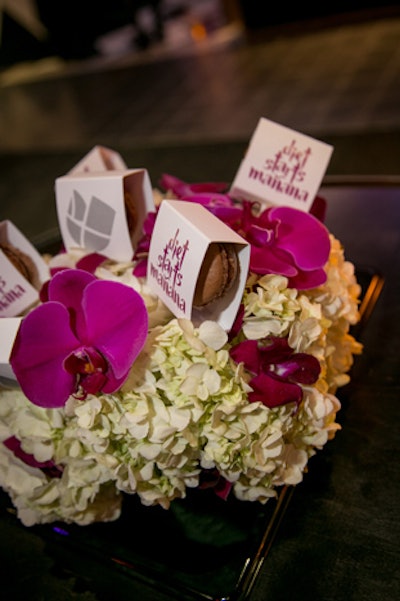 The event took place before the holidays—when weeks of indulgent meals stretched ahead for most guests—so organizers served chocolate macarons with tongue-in-cheek signage that read: 'diet starts manyana.'