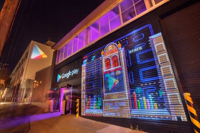Guests were welcomed by a video game projection (Google Play's Game Developer Conference After Party)