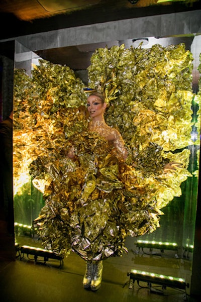 At the Hakkasan Latin Grammy after-party, a model was camouflaged to look like a golden tulip. (Univision's logo represents a tulip.)