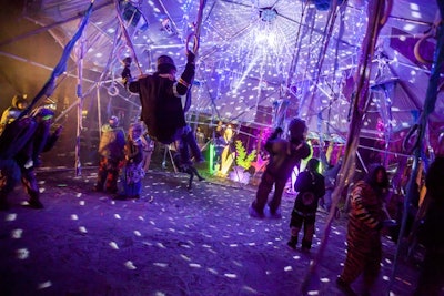 The Jelly Dome by Kickin' It Crew was a popular attraction both during the day and night. Made up of swings and acrobatic fabrics, the structure encouraged guest interaction.