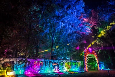 A blacklist mural wall by artist Ania Amador surrounded the entrance to the Spirit Lake area of Suwanee Hulaween.