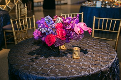 At a screening of the James Brown biopic Get on Up in Washington in July, André Wells incorporated such objects as old-school-style microphones and records into floral centerpieces to channel the movie’s musical premise.