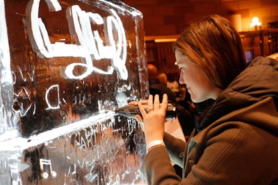 Guests (with the help of Okamoto Studio's crew) used hand tools and drills to make their mark on a glowing, seven-foot-tall ice wall, which can be constructed at events, celebrations, and weddings.