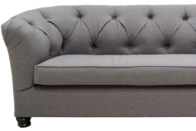 Guests can get comfortable on the tufted Paloma sofa, $395, in gray linen from Designer 8 Event Furniture Rental; it's available in Southern and Northern California and Phoenix.