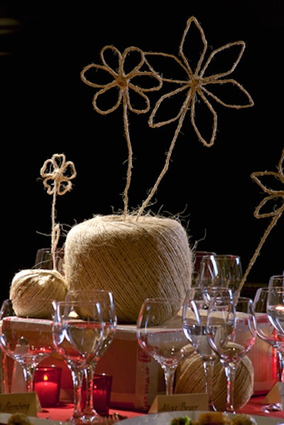 In what could be described as a meta interpretation of a traditional floral centerpiece, David Stark used twine to create flower-shaped centerpieces at the Museum of Arts and Design's Visionary Awards gala in New York in 2007.