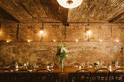Private Dining Room features vaulted ceilings, original masonry, and handmade tile floor