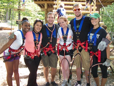 Millenials Enjoy a Group Climb at The Adventure Park