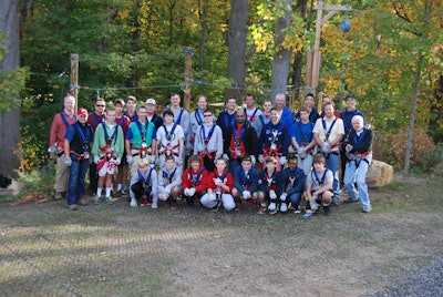 A kid's group climb at The Adventure Park