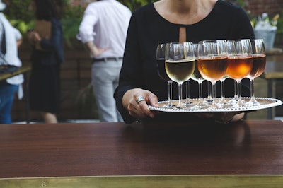 Glasses of wine at an Outdoor Garden cocktail reception