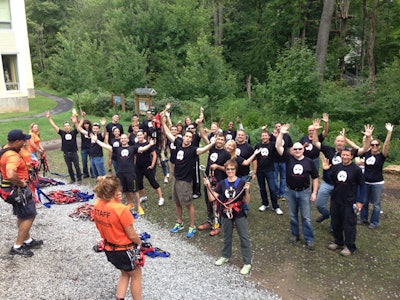 Adult group preparing for a climb at The Adventure Park