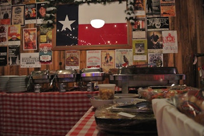 Buffet table set up nicely among the posters holiday rehearsal dinner at Rattle Inn