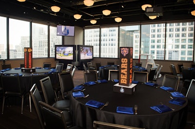 A room set up for a child's party with a Sports' theme