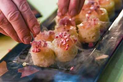 Trummer's on Main served champagne cake topped with a champagne gelée and raspberry bits frozen with liquid nitrogen.