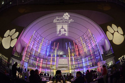 The venue's lighting department projected the event logo and oversize paw prints on the ceiling of the atrium.