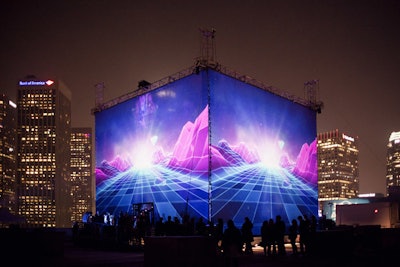 The four-story cube showcased projections that tied into the theme of the evolution of technology.