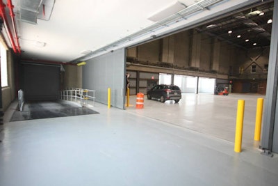 Convenient ramp right from the street for bringing in cars, lifts and heavy duty equipment