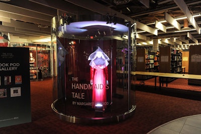 The so-called 'Book Pod Gallery' held displays of costumes and props that brought famous books to life. One such book was The Handmaid's Tale, by Canadian author Margaret Atwood.