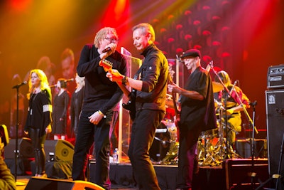 Gary Keller, co-founder of Keller Williams Realty, performs with his band each year at the event's Red Bash party.