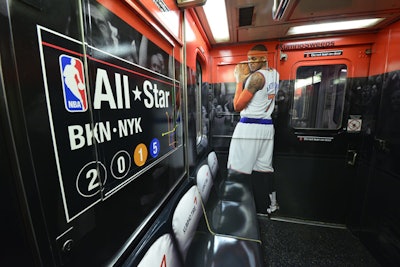 N.B.A. sponsor Kumho Tire promoted its contest to win a game of horse against Carmelo Anthony with a subway station takeover, wrapping the S train and branding the Times Square stop.