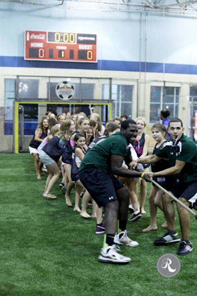 Our attentive and friendly staff leads a game of tug-of-war. May the best team win!