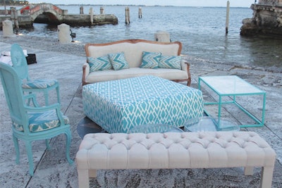 Vintage sofa and aqua diamond patterned ottoman for wedding at Vizcaya Museum