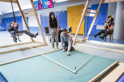 Out-of-the-ordinary activities and experiences within TED's Social Spaces included the Harmonograph Swingset, a modern-day, hand-crafted timber swing that played off a 19th-century invention that recorded harmonic frequencies as visual art.