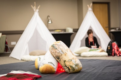 TEDActive attendees seeking a break from the week’s activities—as well as a chance to reflect on the conference's hallmark 'Ideas Worth Spreading'—could find downtime in a tranquil meditation room, where a lounge setup mimicked a campfire setting.