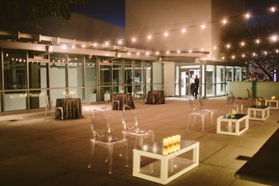 Rooftop garden night view facing west, cocktail reception setup.