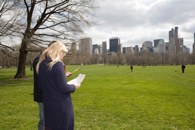 A team scours the city skyline for clues on the Central Park Scavenger Hunt.