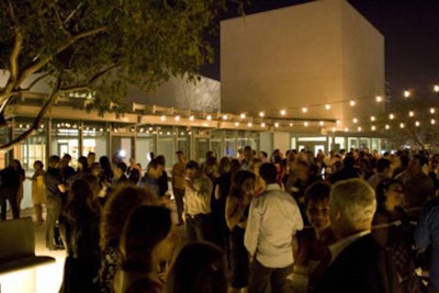 Rooftop garden evening cocktail reception, standing capacity 250.