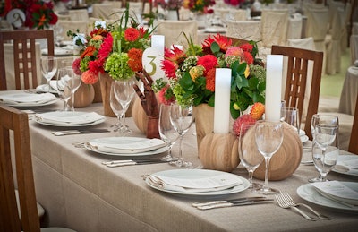 Tones of natural wood, textured linen and gorgeous dahlias pulled the room together