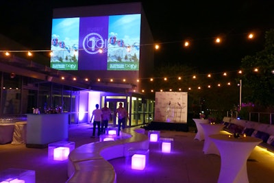 Rooftop garden featuring accent lighting stage and video projection.
