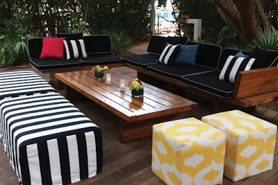 Black and white striped ottomans and yellow patterned cubes for seating at the W Hotel South Beach