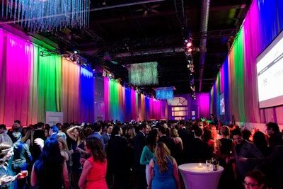 Designers used drapes and bright lights to warm up the reception space.