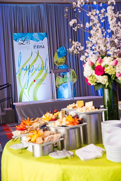 Caterer Centerplate set up multiple buffets of crudite in the silent auction area during the reception.