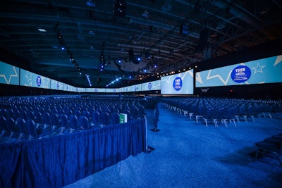 To accommodate the massive general session audience—which is set up for 15,000 people theater-style—Viva Creative wrapped the perimeter with screens.