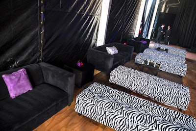 Zebra seating and purple pillows contributed to the glam rock theme of the first evening's event.