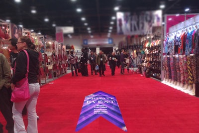 Signs and floor stickers helped invited guests locate the V.I.P. reception on the show floor.